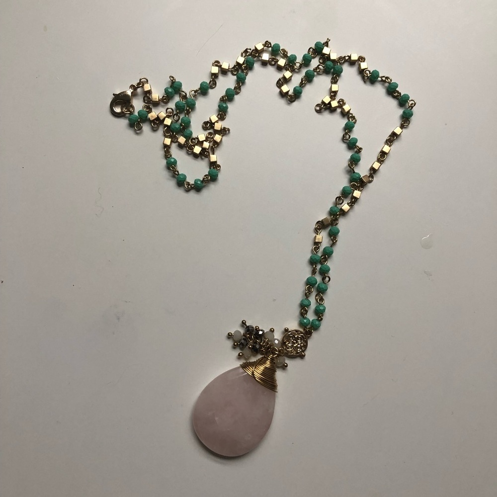 Long gold necklace